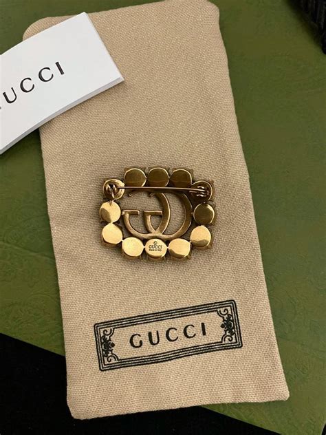 Women's Gucci Brooches .